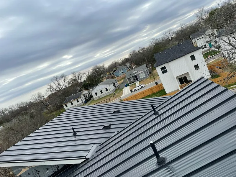 Standing seam metal roof panels with vents for Skylight Repair in West Seneca